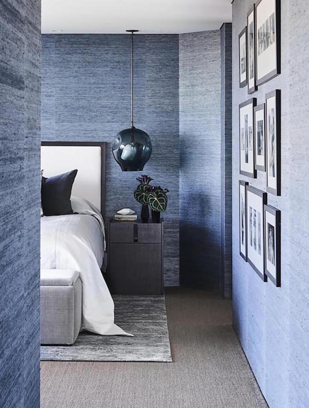 POCO Design's have used a textured Phillip Jeffries wallpaper to give this Master Bedroom the ultimate sophisticated touch.